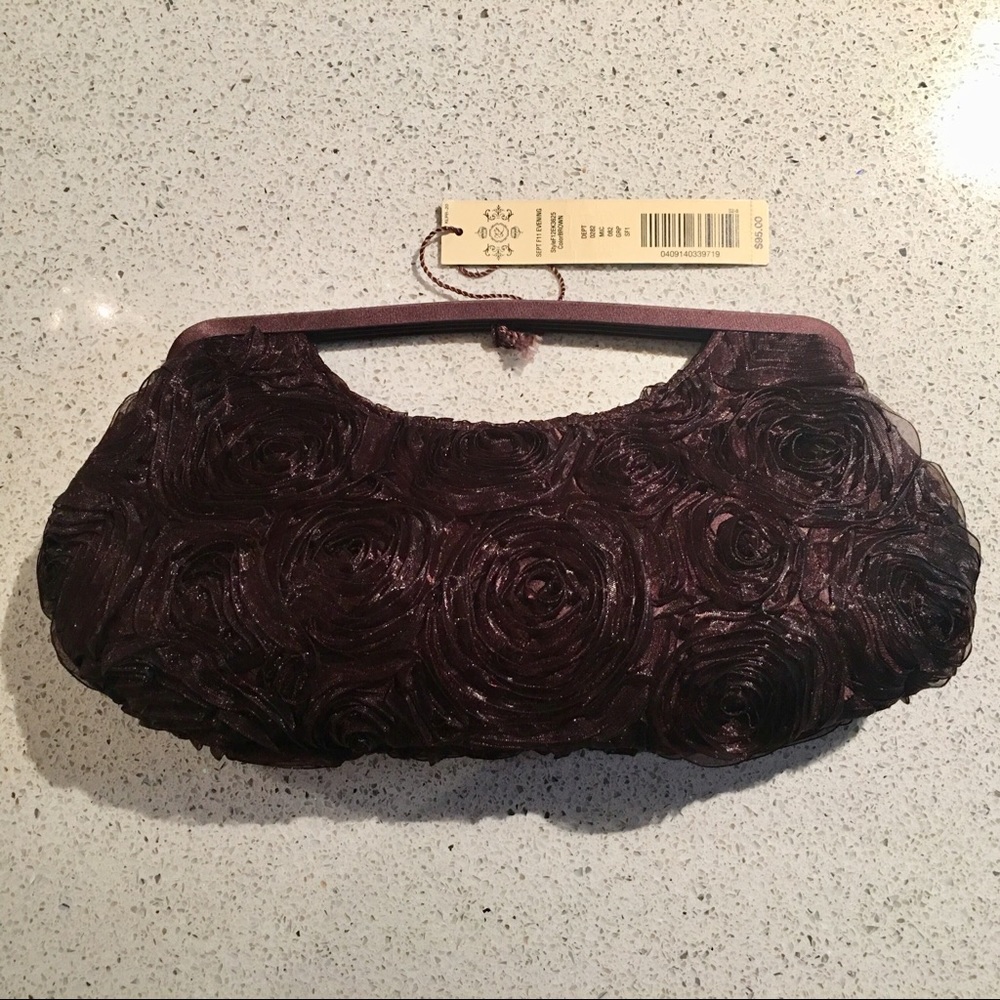 Kate Laundry Brown rose petal clutch w/strap.